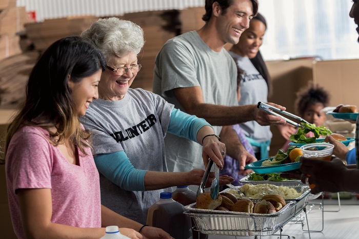 Volunteers Serving Food